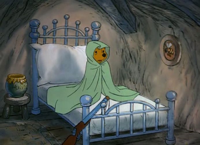 (Winnie the Pooh wrapped in a blanket)